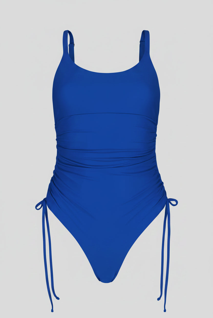 Blue swimsuit with thin straps on a white background
