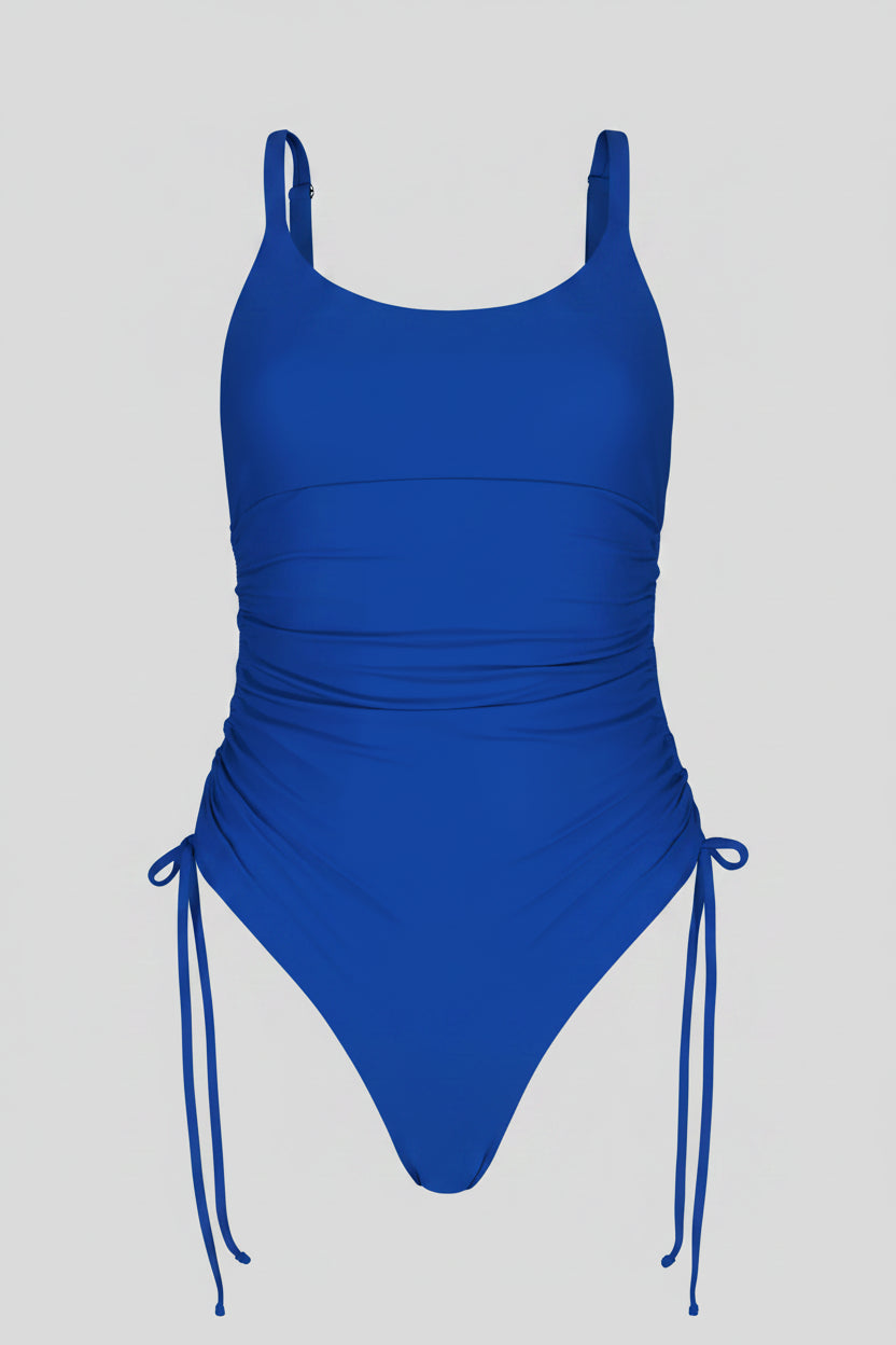 Blue swimsuit with thin straps on a white background