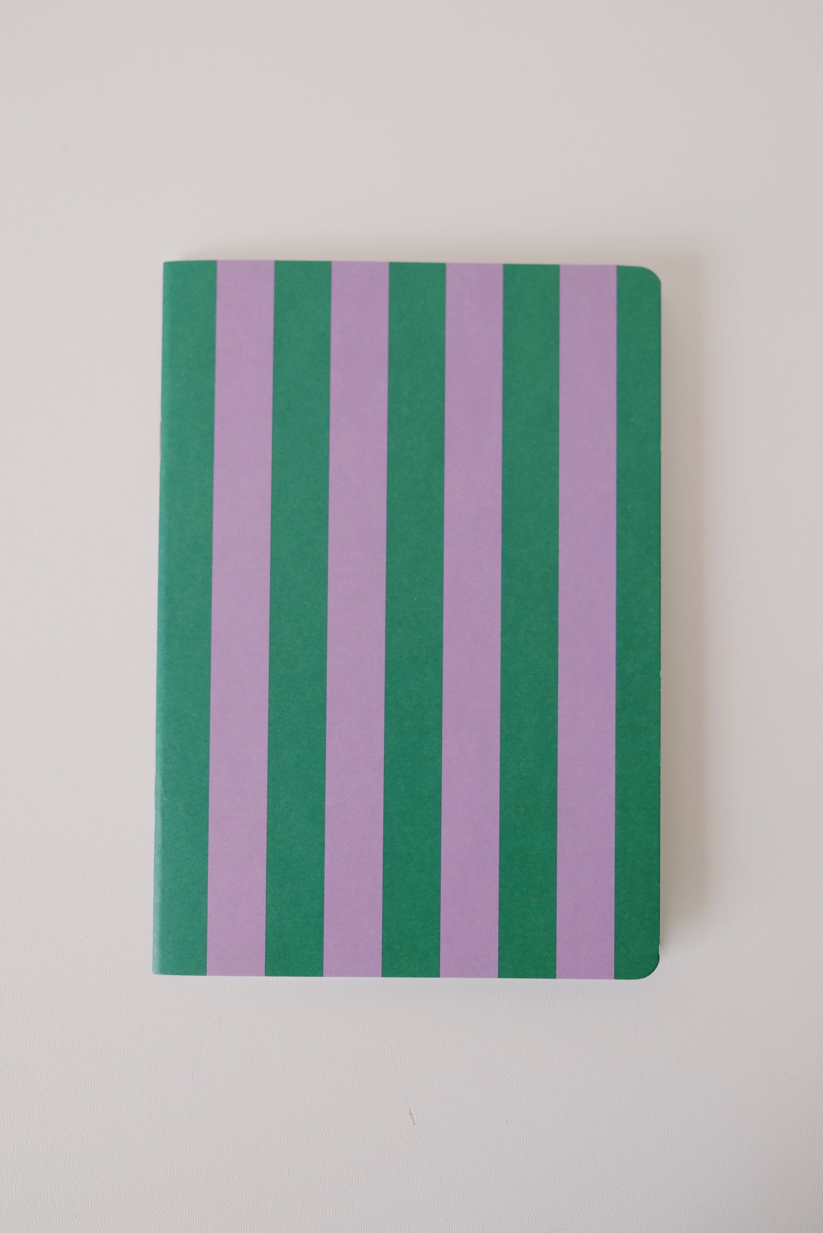 notebook - purple green stripes - collab zürich