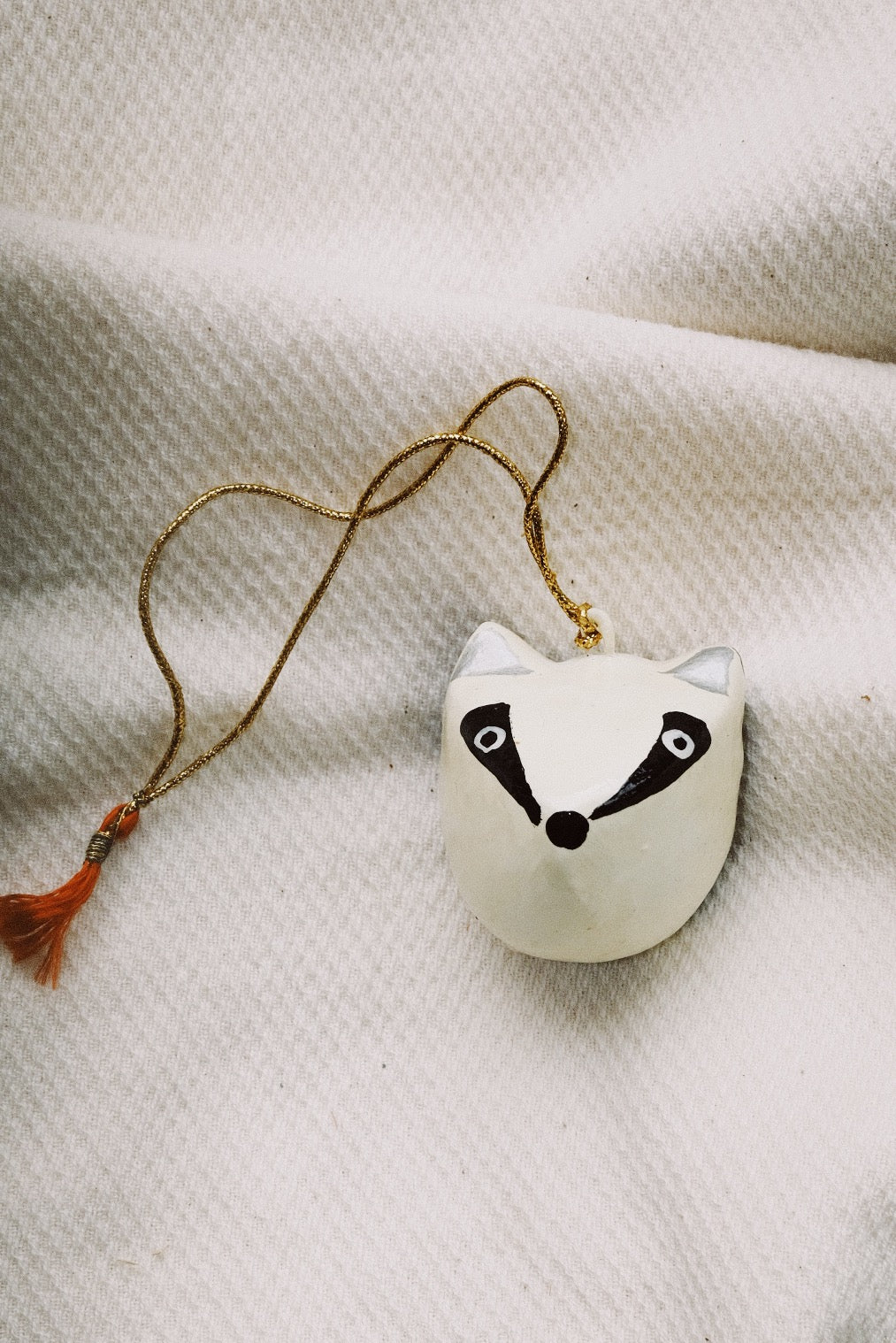 unbreakable christmas ornament - badger head - collab zürich