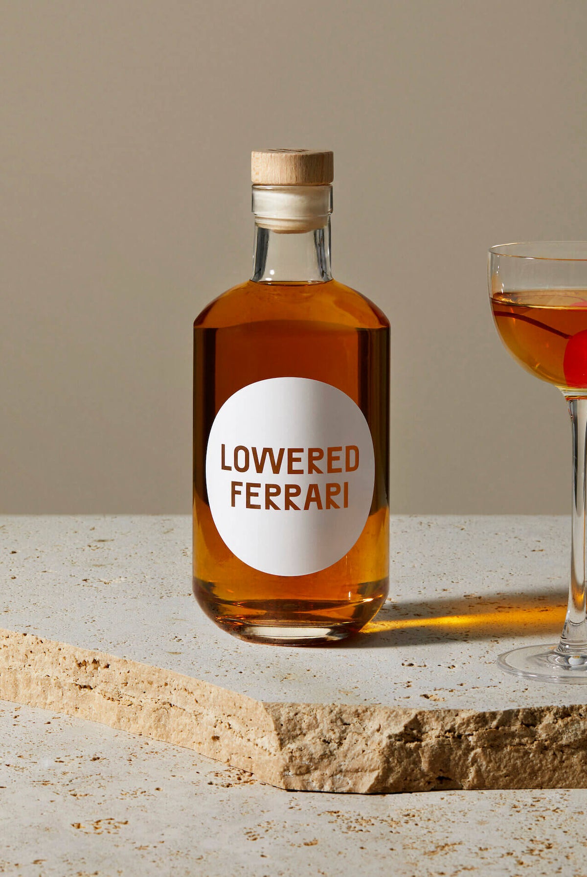 cocktail in a bottle - lowered ferrari - collab zürich