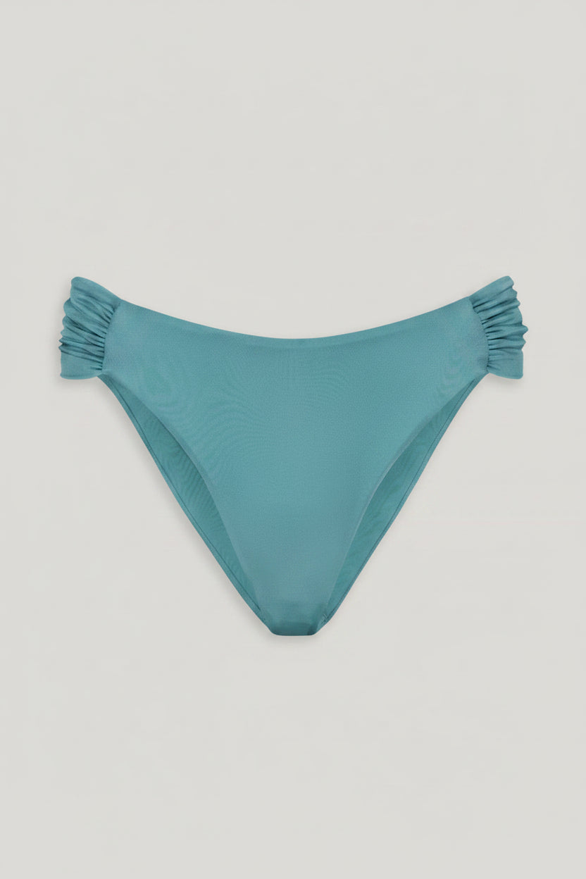 Teal bikini bottom with ruched sides on a white background