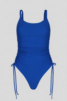 Blue swimsuit with thin straps on a white background