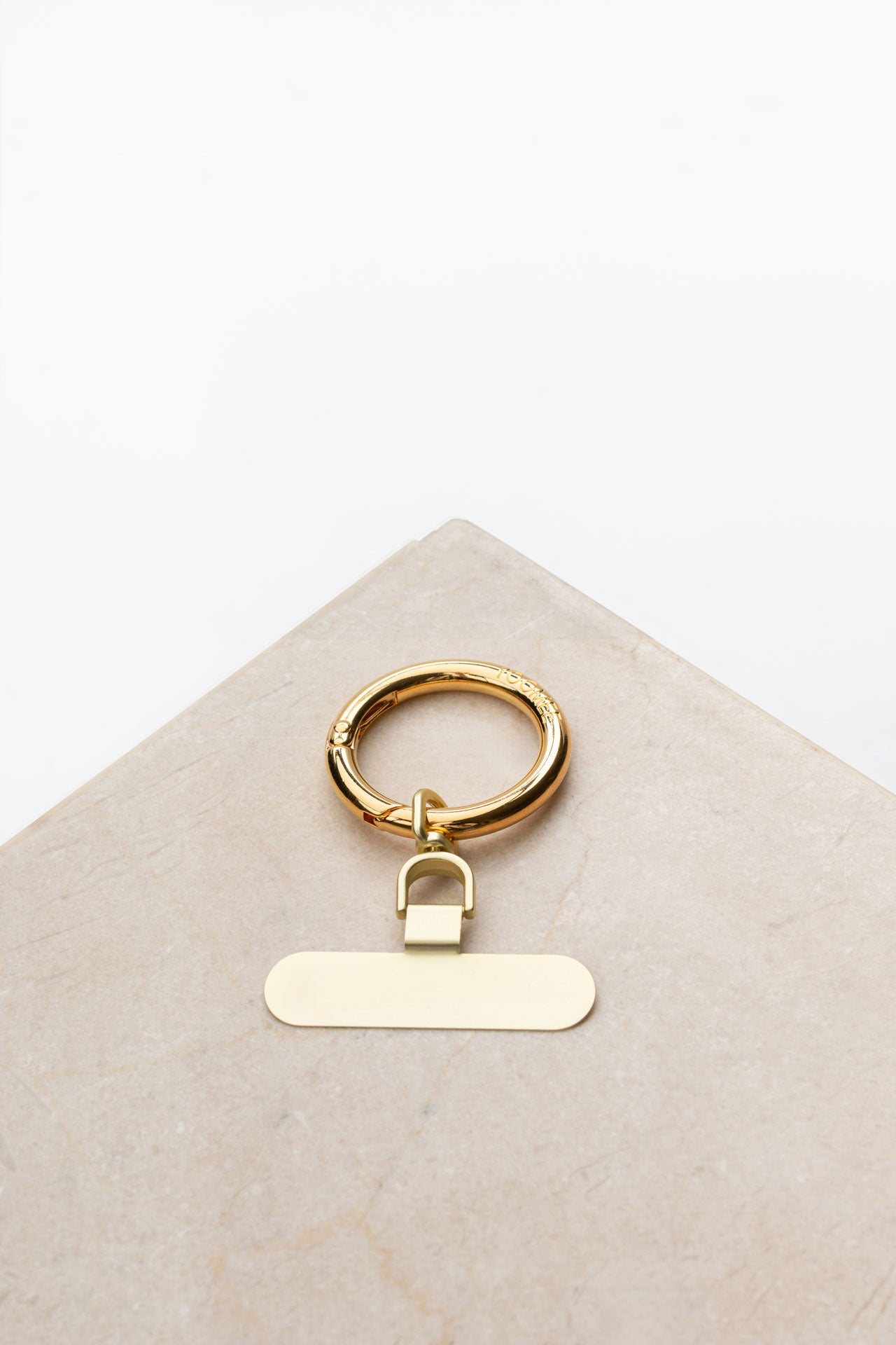 set - phone clip & classic carabiner - gold - collab zürich