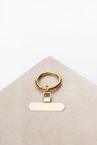 set - phone clip & classic carabiner - gold - collab zürich