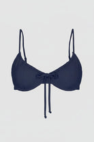 Navy blue bikini top with thin straps on a white background