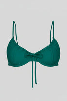 Teal bikini top on a white background