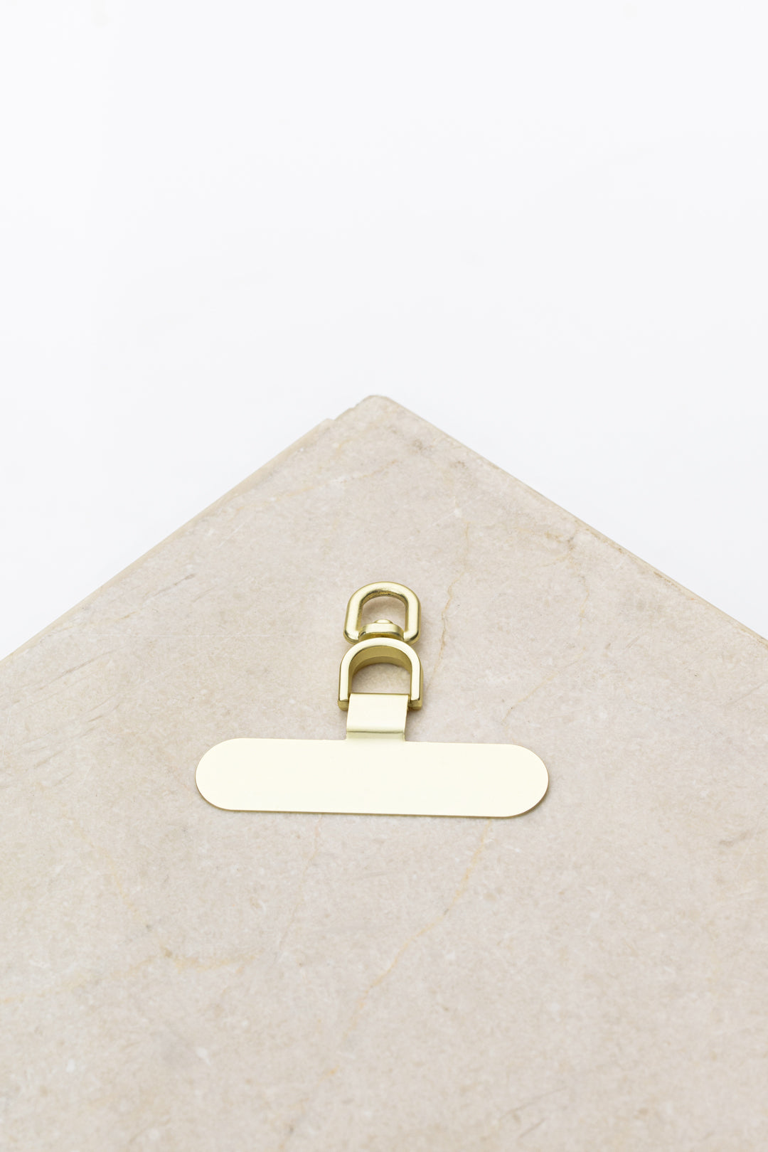 phone clip - gold - collab zürich