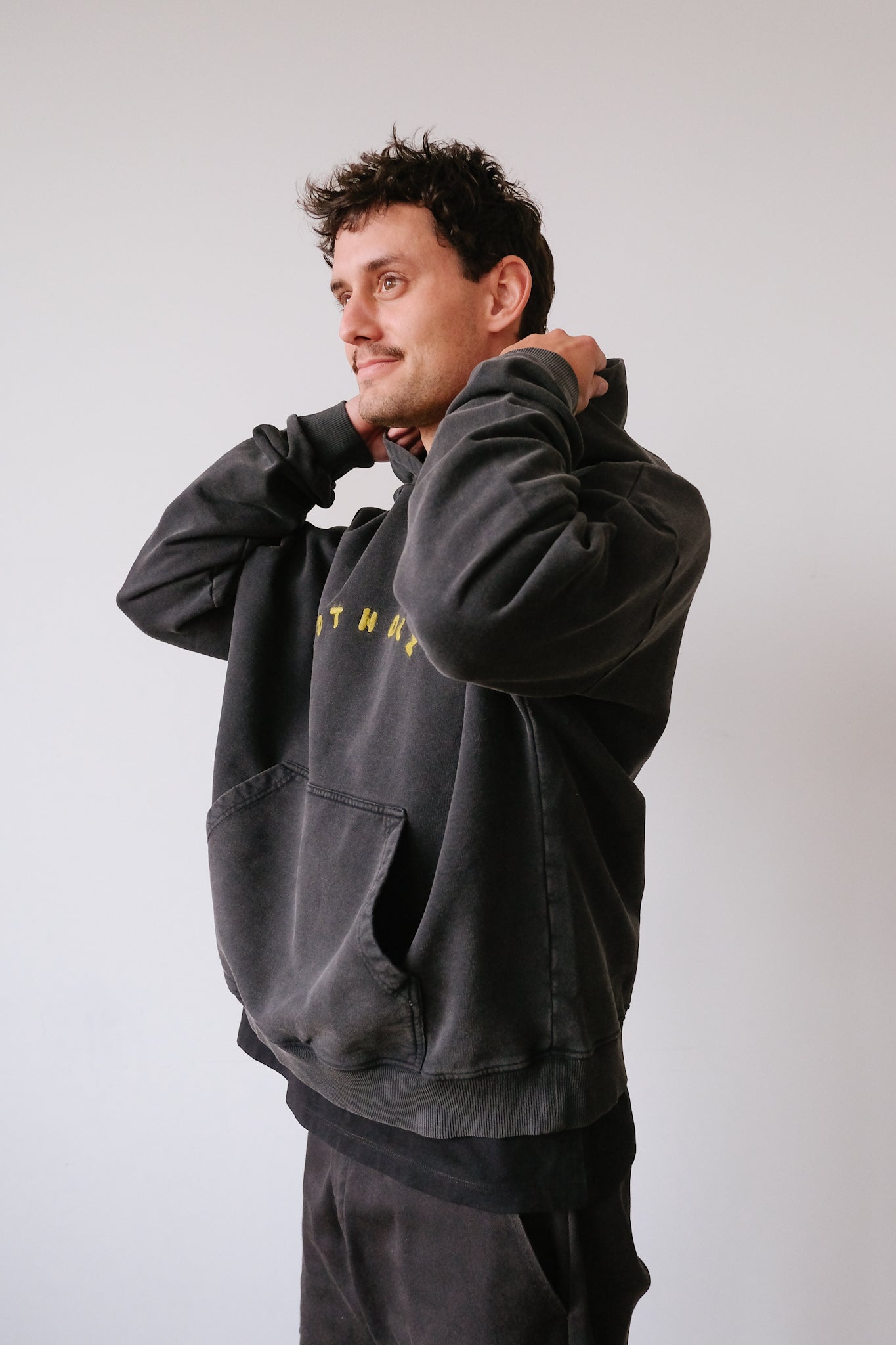 unisex hoodie - bubby logo - faded black - collab zürich