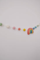 felt garland - rainbow pompoms - collab zürich