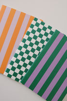 notebook - orange lilac stripes - collab zürich