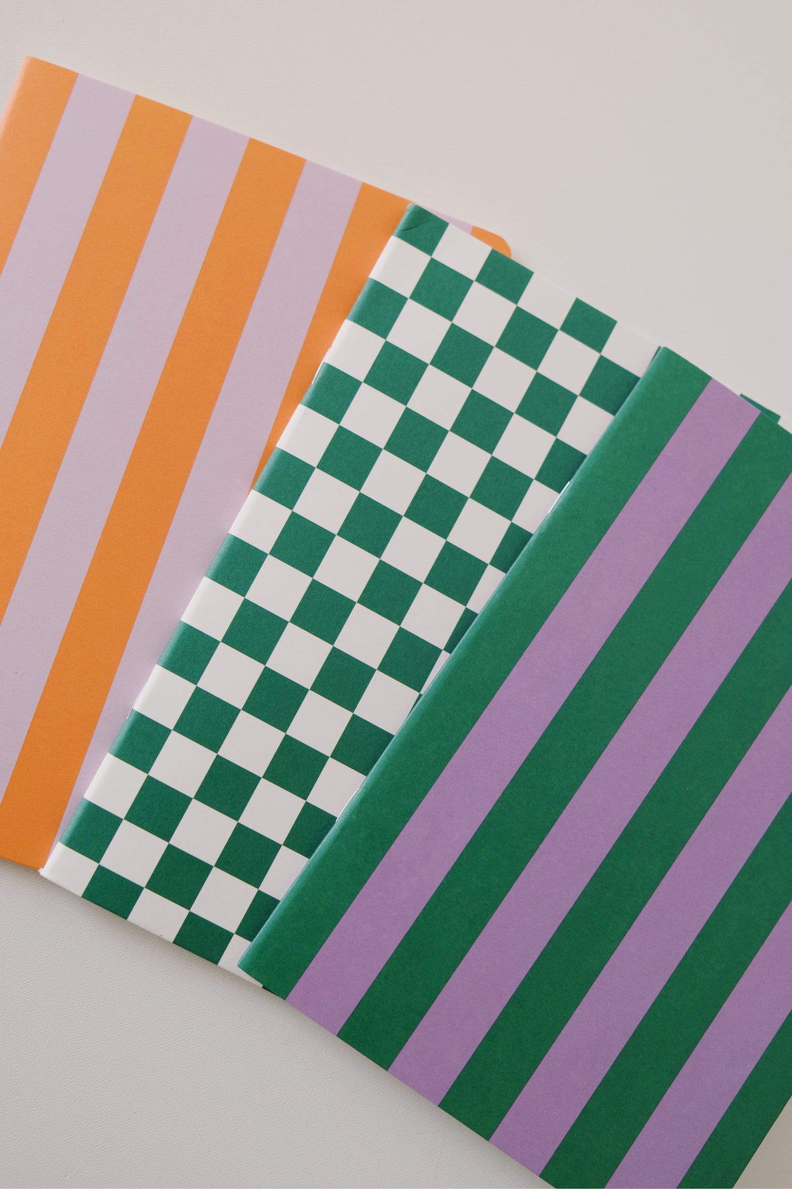 notebook - orange lilac stripes - collab zürich