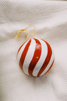 unbreakable christmas ornament - off-white red swirl ball - collab zürich